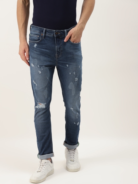 United Colors of Benetton Men Navy Blue Mildly Distressed Carrot Fit Stretchable Jeans
United Colors of Benetton Men Navy Blue Mildly Distressed Carrot Fit Stretchable Jeans