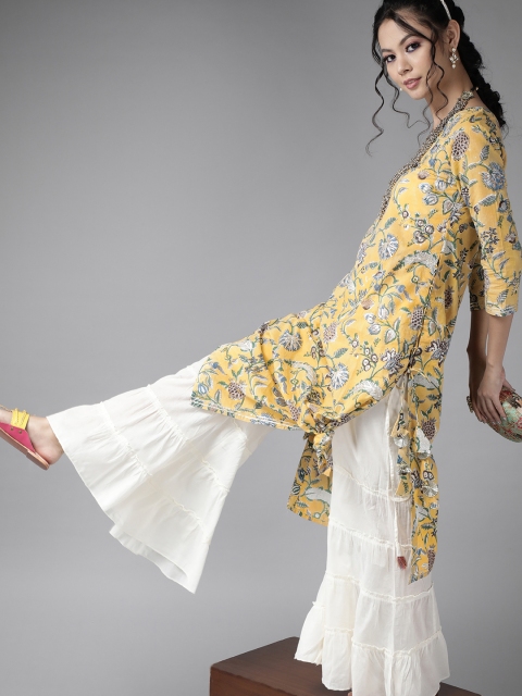 Indo Era Women Mustard Yellow & Off-White Romantic Floral Print Cotton Kurta with Sharara
Indo Era Women Mustard Yellow & Off-White Romantic Floral Print Cotton Kurta with Sharara