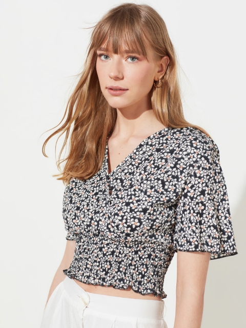 TRENDYOL COLLECTION Black & Off-White Ditsy Floral Flared Sleeves Cinched Waist Crop Top
TRENDYOL COLLECTION Black & Off-White Ditsy Floral Flared Sleeves Cinched Waist Crop Top