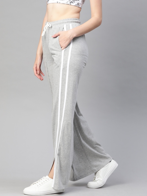 VividArtsy Women Grey Melange Solid Pure Cotton Wide Track Pants with Striped Details
VividArtsy Women Grey Melange Solid Pure Cotton Wide Track Pants with Striped Details