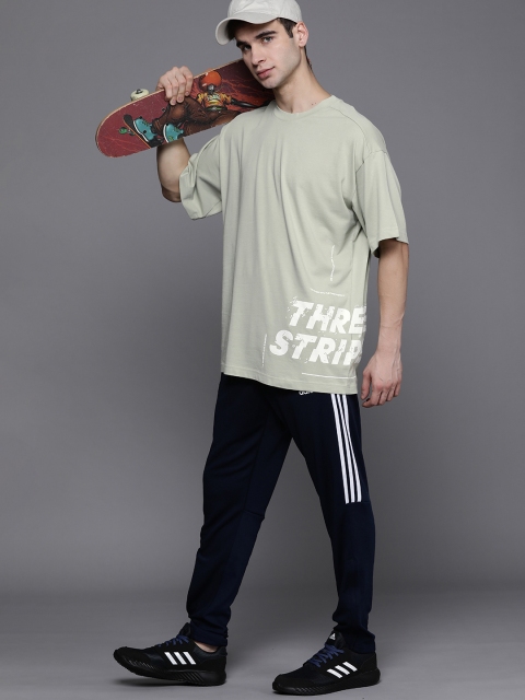 ADIDAS Men Green Typography Printed WRD S/S Drop-Shoulder Sleeves Pure Cotton T-shirt
ADIDAS Men Green Typography Printed WRD S/S Drop-Shoulder Sleeves Pure Cotton T-shirt