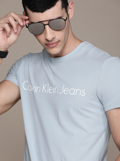 Calvin Klein Jeans Men Blue Brand Logo Printed Slim Fit T-shirt 
Calvin Klein Jeans Men Blue Brand Logo Printed Slim Fit T-shirt