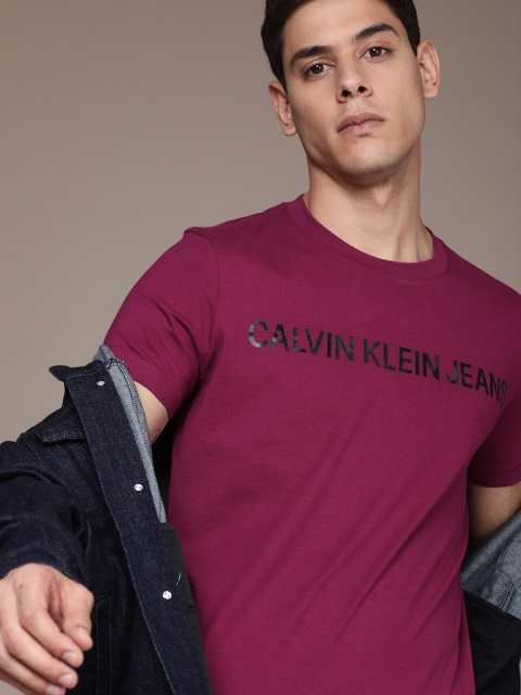 Calvin Klein Jeans Men Maroon Brand Logo Printed Organic Cotton Slim Fit Organic Cotton T-shirt
Calvin Klein Jeans Men Maroon Brand Logo Printed Organic Cotton Slim Fit Organic Cotton T-shirt