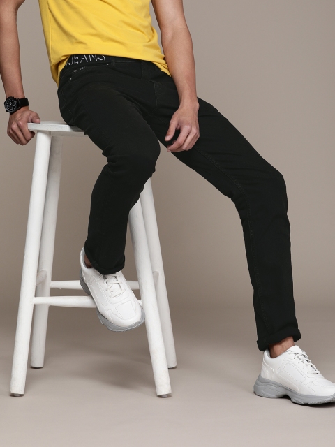 Calvin Klein Jeans Men Black Slim Fit Mid-Rise Clean Look Stretchable Jeans With Logo Tape
Calvin Klein Jeans Men Black Slim Fit Mid-Rise Clean Look Stretchable Jeans With Logo Tape