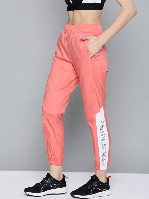 HRX by Hrithik Roshan Training Women Desert Rose Rapid-Dry Brand Carrier Track Pants, Peach
HRX by Hrithik Roshan Training Women Desert Rose Rapid-Dry Brand Carrier Track Pants, Peach