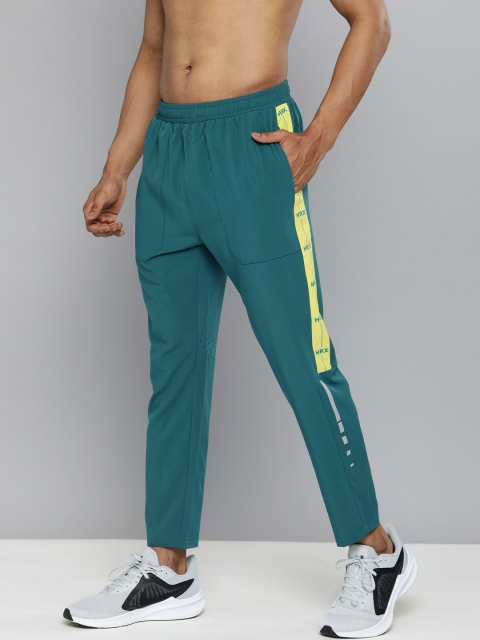 HRX By Hrithik Roshan Men Blue & F.light Slim Colourblocked Rapid-Dry Running Track Pants
HRX By Hrithik Roshan Men Blue & F.light Slim Colourblocked Rapid-Dry Running Track Pants