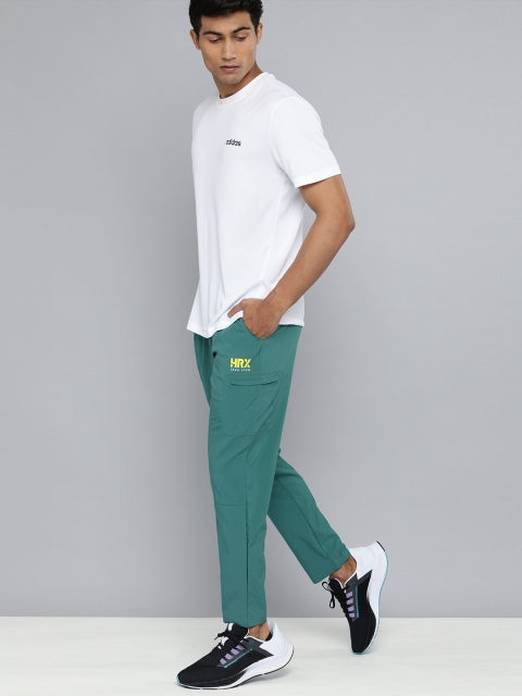 HRX By Hrithik Roshan Men Verdigris Tapered Brand Carrier Rapid-Dry Training Track Pants, Teal
HRX By Hrithik Roshan Men Verdigris Tapered Brand Carrier Rapid-Dry Training Track Pants, Teal