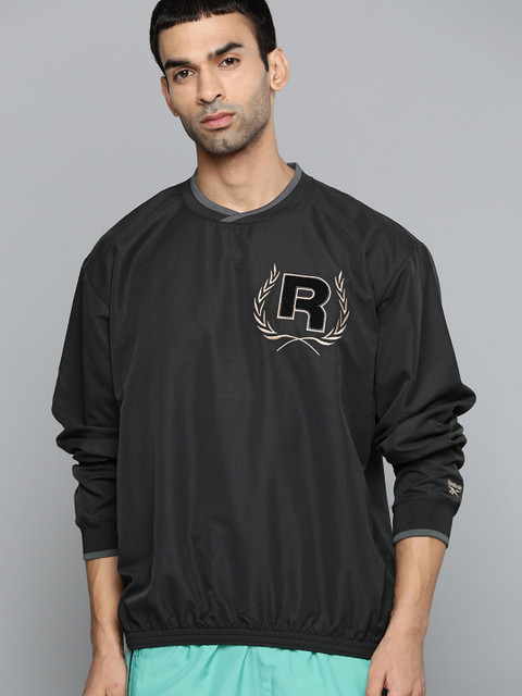 Reebok Classic Men Charcoal Grey Solid Golf Crew Sweatshirt 
Reebok Classic Men Charcoal Grey Solid Golf Crew Sweatshirt