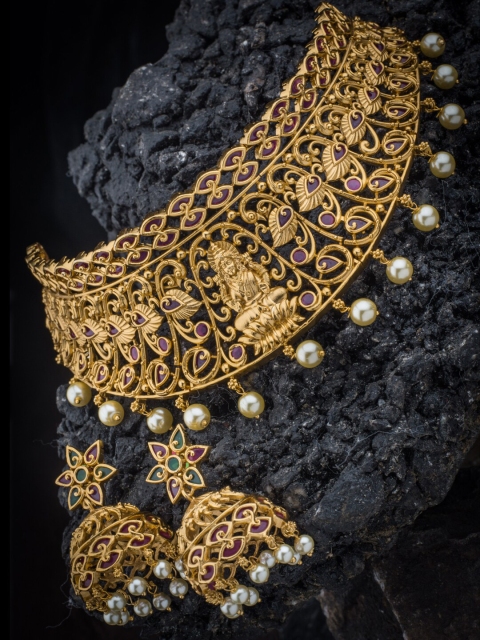 Alankruthi Women Gold-Plated Pink & Green Stone-Studded Lakshmi Temple Jewellery Set
Alankruthi Women Gold-Plated Pink & Green Stone-Studded Lakshmi Temple Jewellery Set