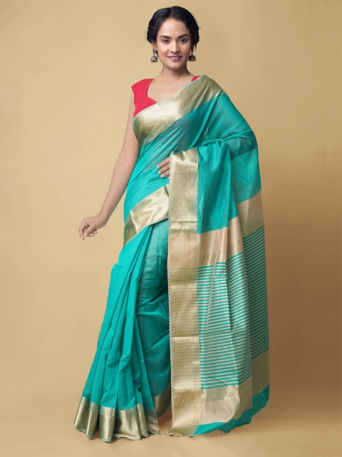 Unnati Silks Sea Green & Gold-Toned Woven Design Zari Silk Cotton Maheshwari Saree
Unnati Silks Sea Green & Gold-Toned Woven Design Zari Silk Cotton Maheshwari Saree