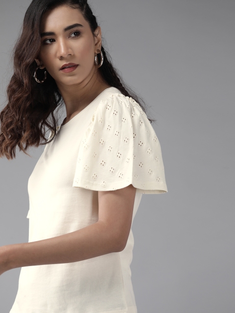 Roadster Cream-Coloured Solid Pure Cotton Regular Top with Schiffli Embroidered Detail
Roadster Cream-Coloured Solid Pure Cotton Regular Top with Schiffli Embroidered Detail