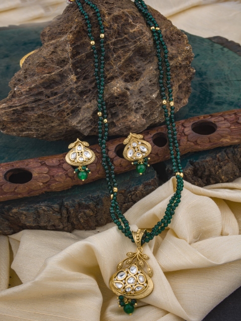 Alankruthi Women Gold-Plated Green Kundan-Studded Crystal Beaded Temple Jewellery Set
Alankruthi Women Gold-Plated Green Kundan-Studded Crystal Beaded Temple Jewellery Set