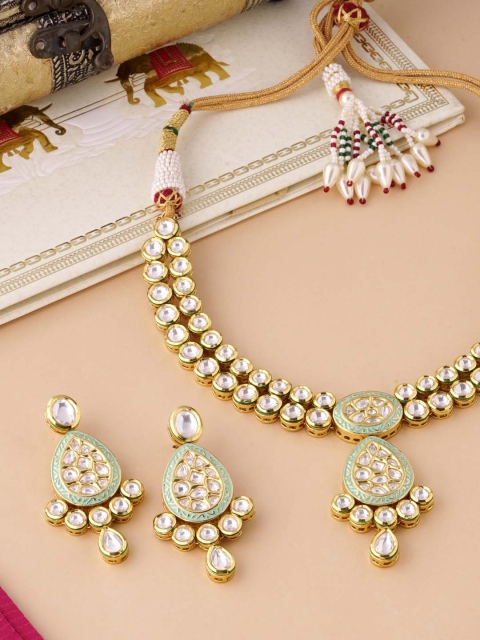 Tistabene Gold-Toned & White Stone-Studded & Beaded Enamelled Traditional Jewellery Set
Tistabene Gold-Toned & White Stone-Studded & Beaded Enamelled Traditional Jewellery Set