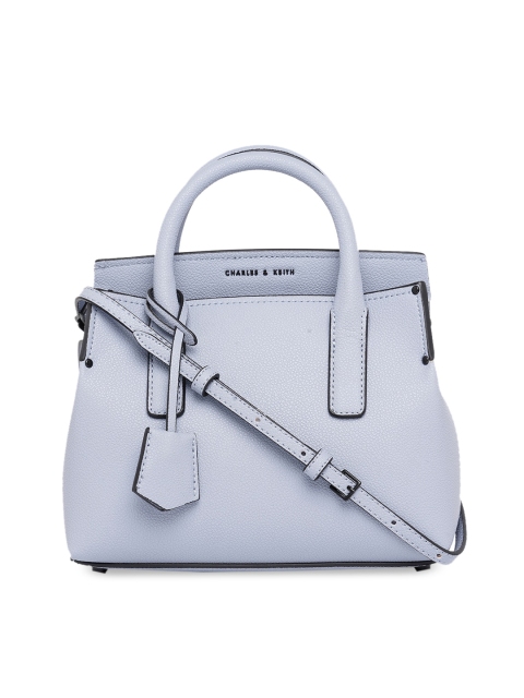 CHARLES & KEITH Turquoise Blue PU Swagger Handheld Bag with Tasselled Detail
CHARLES & KEITH Turquoise Blue PU Swagger Handheld Bag with Tasselled Detail