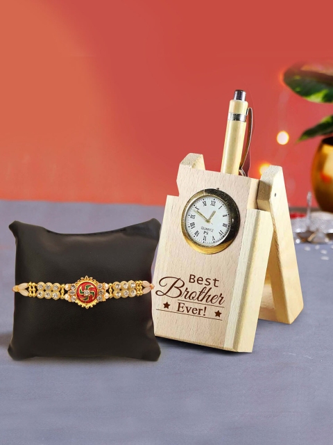 TIED RIBBONS Multicoloured Rakhi with Wooden Penstand & Roli Chawal Combo Pack, Multi
TIED RIBBONS Multicoloured Rakhi with Wooden Penstand & Roli Chawal Combo Pack, Multi