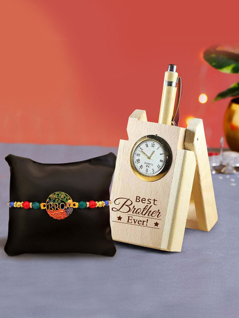 TIED RIBBONS Multicoloured Rakhi with Wooden Penstand & Roli Chawal Combo Pack, Multi
TIED RIBBONS Multicoloured Rakhi with Wooden Penstand & Roli Chawal Combo Pack, Multi