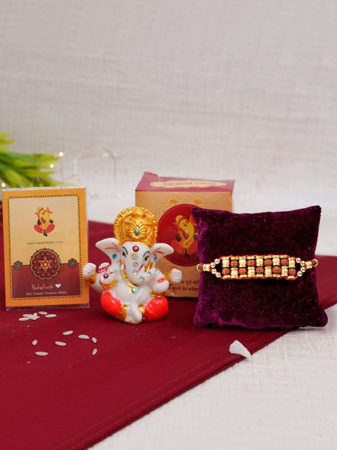 TIED RIBBONS Multicoloured Rakhi with Mini Ganesha Idol, Card & Roli Chawal Gift Set, Multi
TIED RIBBONS Multicoloured Rakhi with Mini Ganesha Idol, Card & Roli Chawal Gift Set, Multi