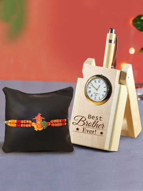 TIED RIBBONS Rakhi for Brother with Wooden Penstand with Clock & Card Combo Gift Set, Gold
TIED RIBBONS Rakhi for Brother with Wooden Penstand with Clock & Card Combo Gift Set, Gold