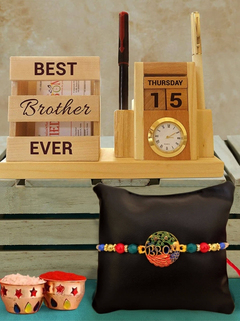 TIED RIBBONS Multicolored Bhai Rakhi & Wooden Penstand with Calendar Combo Gift Set, Multi
TIED RIBBONS Multicolored Bhai Rakhi & Wooden Penstand with Calendar Combo Gift Set, Multi