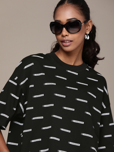 Calvin Klein Jeans Women Black & White Brand Logo Printed Drop-Shoulder Sleeves T-shirt
Calvin Klein Jeans Women Black & White Brand Logo Printed Drop-Shoulder Sleeves T-shirt