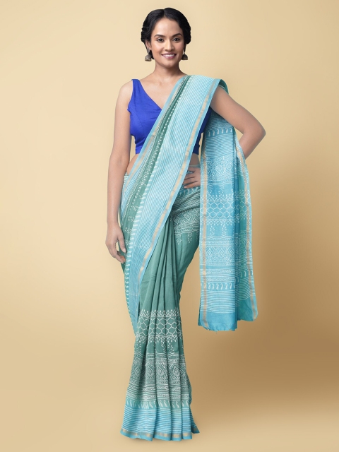 Unnati Silks Green & Turquoise Blue Ethnic Motifs Block Printed Silk Cotton Chanderi Saree
Unnati Silks Green & Turquoise Blue Ethnic Motifs Block Printed Silk Cotton Chanderi Saree