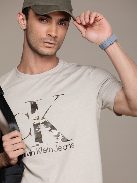 Calvin Klein Jeans Men Beige & Olive Green SS CAMO MGM Brand Logo Printed T-shirt
Calvin Klein Jeans Men Beige & Olive Green SS CAMO MGM Brand Logo Printed T-shirt