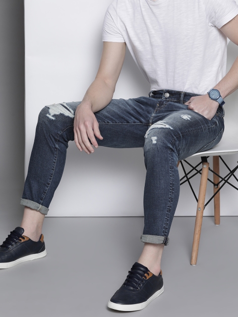 AMERICAN EAGLE OUTFITTERS Men Blue Slim Fit Mildly Distressed Light Fade Stretchable Jeans
AMERICAN EAGLE OUTFITTERS Men Blue Slim Fit Mildly Distressed Light Fade Stretchable Jeans