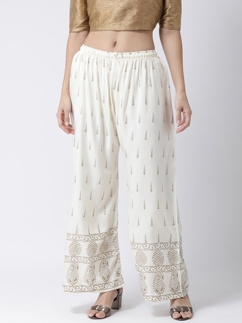 Charitra Women Off White & Gold-Toned Floral Printed Palazzos 
Charitra Women Off White & Gold-Toned Floral Printed Palazzos
