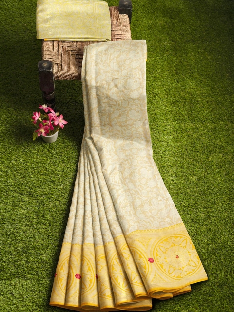 KLM Fashion Mall Cream-Coloured & Yellow Ethnic Motifs Zari Silk Blend Banarasi Saree
KLM Fashion Mall Cream-Coloured & Yellow Ethnic Motifs Zari Silk Blend Banarasi Saree