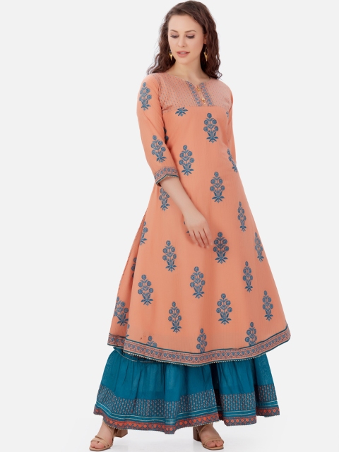 Kiana Women Peach-Coloured & Blue Ethnic Motifs Printed Pure Cotton Kurta with Sharara
Kiana Women Peach-Coloured & Blue Ethnic Motifs Printed Pure Cotton Kurta with Sharara