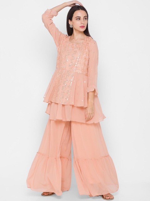 ZOLA Women Peach-Coloured Floral Embroidered Layered Kurti with Sharara & With Dupatta
ZOLA Women Peach-Coloured Floral Embroidered Layered Kurti with Sharara & With Dupatta