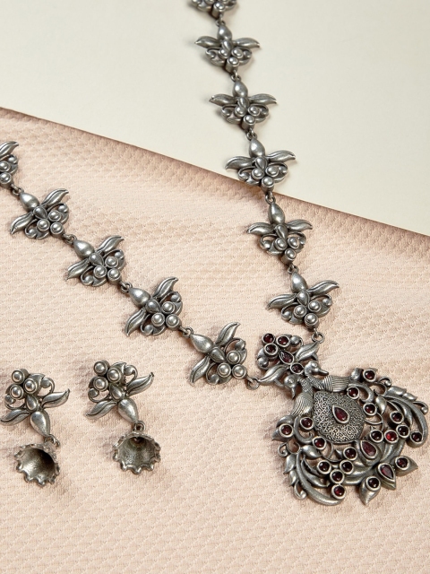GloBox By ZeroKaata Oxidised Silver-Plated Maroon Gemstones-Studded Antique Jewellery Set
GloBox By ZeroKaata Oxidised Silver-Plated Maroon Gemstones-Studded Antique Jewellery Set