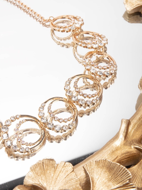 Lilly & Sparkle Women Gold Toned Diamond Studded Circular Design Statement Necklace
Lilly & Sparkle Women Gold Toned Diamond Studded Circular Design Statement Necklace