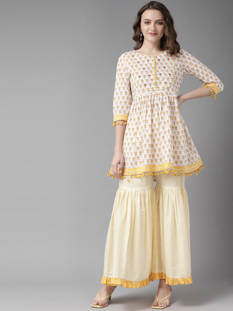 Amirah s Women Off White Floral Printed Empire Beads and Stones Pure Cotton Kurta with Sharara 
Amirah s Women Off White Floral Printed Empire Beads and Stones Pure Cotton Kurta with Sharara