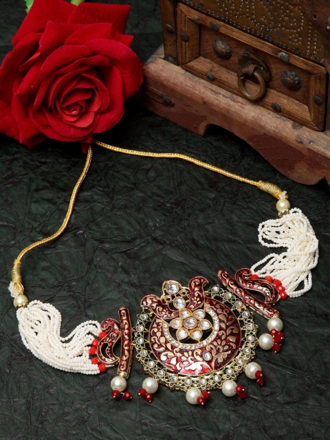 Moedbuille Women Red & Off White Gold-Plated Kundan & Pearl Studded Hand Painted Choker
Moedbuille Women Red & Off White Gold-Plated Kundan & Pearl Studded Hand Painted Choker
