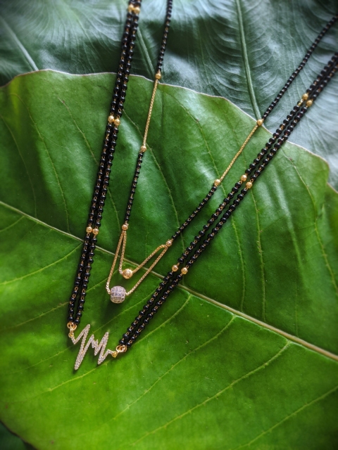 Digital Dress Room Set Of 2 Gold-Plated White & Black Stone-Studded Beaded Mangalsutra
Digital Dress Room Set Of 2 Gold-Plated White & Black Stone-Studded Beaded Mangalsutra