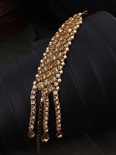 ANIKAS CREATION Women Gold-Plated & Beige Brass Gold-Plated Wraparound Bracelet
ANIKAS CREATION Women Gold-Plated & Beige Brass Gold-Plated Wraparound Bracelet