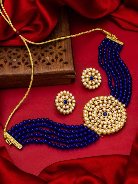 aadita Gold-Plated White & Blue Stone-Studded & Pearl Beaded Handcrafted Jewellery Set
aadita Gold-Plated White & Blue Stone-Studded & Pearl Beaded Handcrafted Jewellery Set