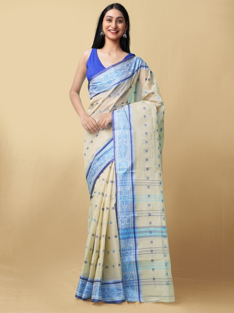Unnati Silks Women Beige & Blue Pure Handloom Bengal Tant Cotton Sustainable Saree
Unnati Silks Women Beige & Blue Pure Handloom Bengal Tant Cotton Sustainable Saree