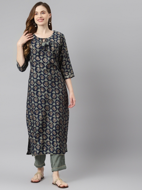 Readiprint Fashions Women Navy Blue & Green Ethnic Motifs Printed Kurta with Trousers
Readiprint Fashions Women Navy Blue & Green Ethnic Motifs Printed Kurta with Trousers