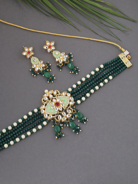VIRAASI Gold-Toned & Green Kundan Stone Studded & Beaded Jewellery Set
VIRAASI Gold-Toned & Green Kundan Stone Studded & Beaded Jewellery Set