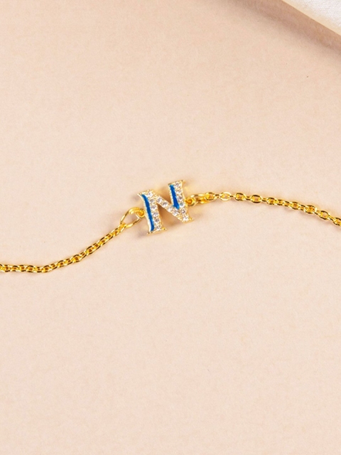 Pipa Bella Teal Blue Gold-Plated Cubic Zirconia Studded Enamelled N Initial Link Bracelet
Pipa Bella Teal Blue Gold-Plated Cubic Zirconia Studded Enamelled N Initial Link Bracelet