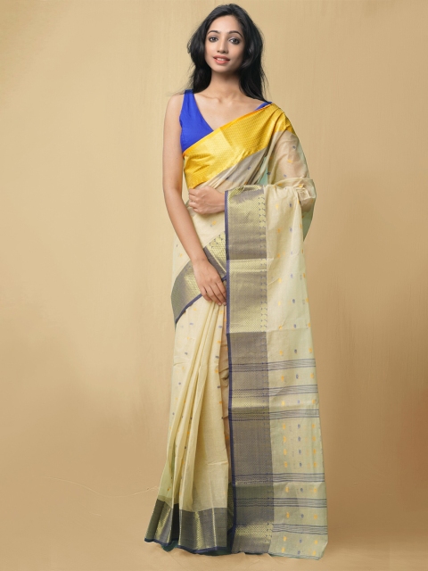 Unnati Silks Beige & Blue Woven Design Pure Handloom Sustainable Bengal Tant Cotton Saree
Unnati Silks Beige & Blue Woven Design Pure Handloom Sustainable Bengal Tant Cotton Saree