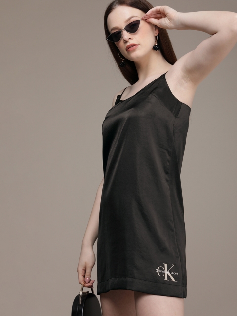 Calvin Klein Jeans Black Solid Shoulder Straps Polyester Satin Slip A-Line Mini Cami Dress
Calvin Klein Jeans Black Solid Shoulder Straps Polyester Satin Slip A-Line Mini Cami Dress
