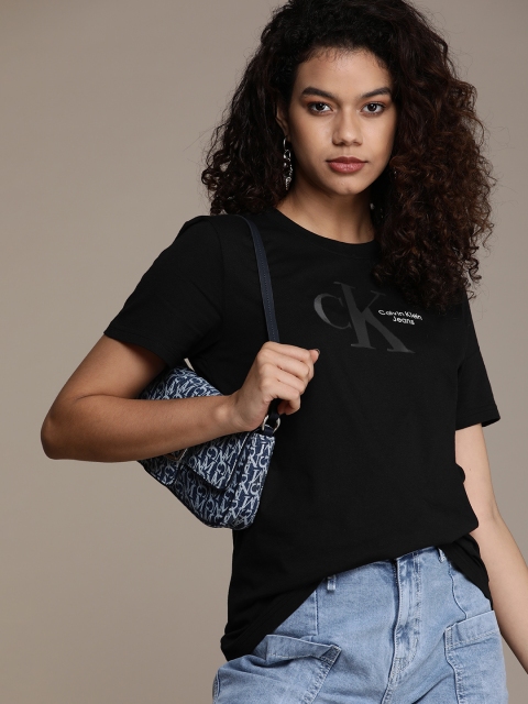 Calvin Klein Jeans Women Black Brand Logo Print Round Neck Pure Cotton Applique T-shirt
Calvin Klein Jeans Women Black Brand Logo Print Round Neck Pure Cotton Applique T-shirt