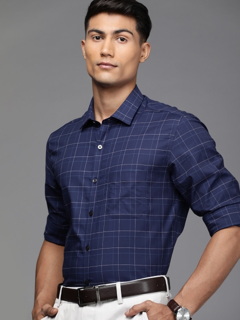 Louis Philippe Permapress Men Navy Blue & White Slim Fit Checked Pure Cotton Formal Shirt
Louis Philippe Permapress Men Navy Blue & White Slim Fit Checked Pure Cotton Formal Shirt