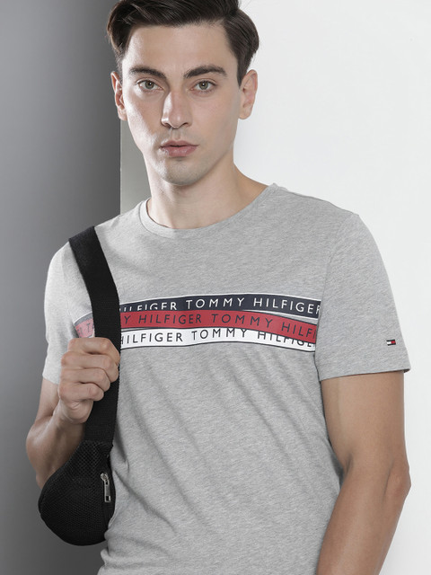 Tommy Hilfiger Men Grey Brand Logo Printed Pure Cotton T-shirt 
Tommy Hilfiger Men Grey Brand Logo Printed Pure Cotton T-shirt