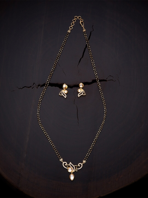 Kushal's Fashion Jewellery Gold-Plated Black & White Stone Studded & Beaded Mangalsutra With Earing
Kushal's Fashion Jewellery Gold-Plated Black & White Stone Studded & Beaded Mangalsutra With Earing