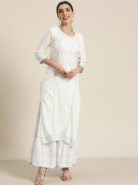 Juniper Women Off White & Blue Ethnic Motifs Print Gotta Patti Straight Kurta with Sharara
Juniper Women Off White & Blue Ethnic Motifs Print Gotta Patti Straight Kurta with Sharara