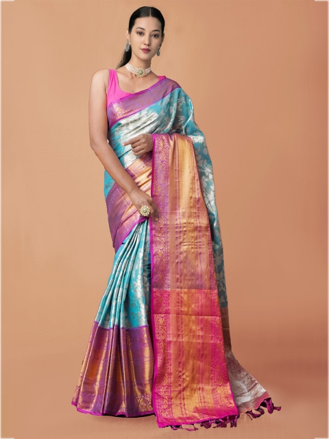 Unnati Silks Turquoise Blue & Gold-Toned Ethnic Motifs Zari Silk Blend Kanjeevaram Saree
Unnati Silks Turquoise Blue & Gold-Toned Ethnic Motifs Zari Silk Blend Kanjeevaram Saree